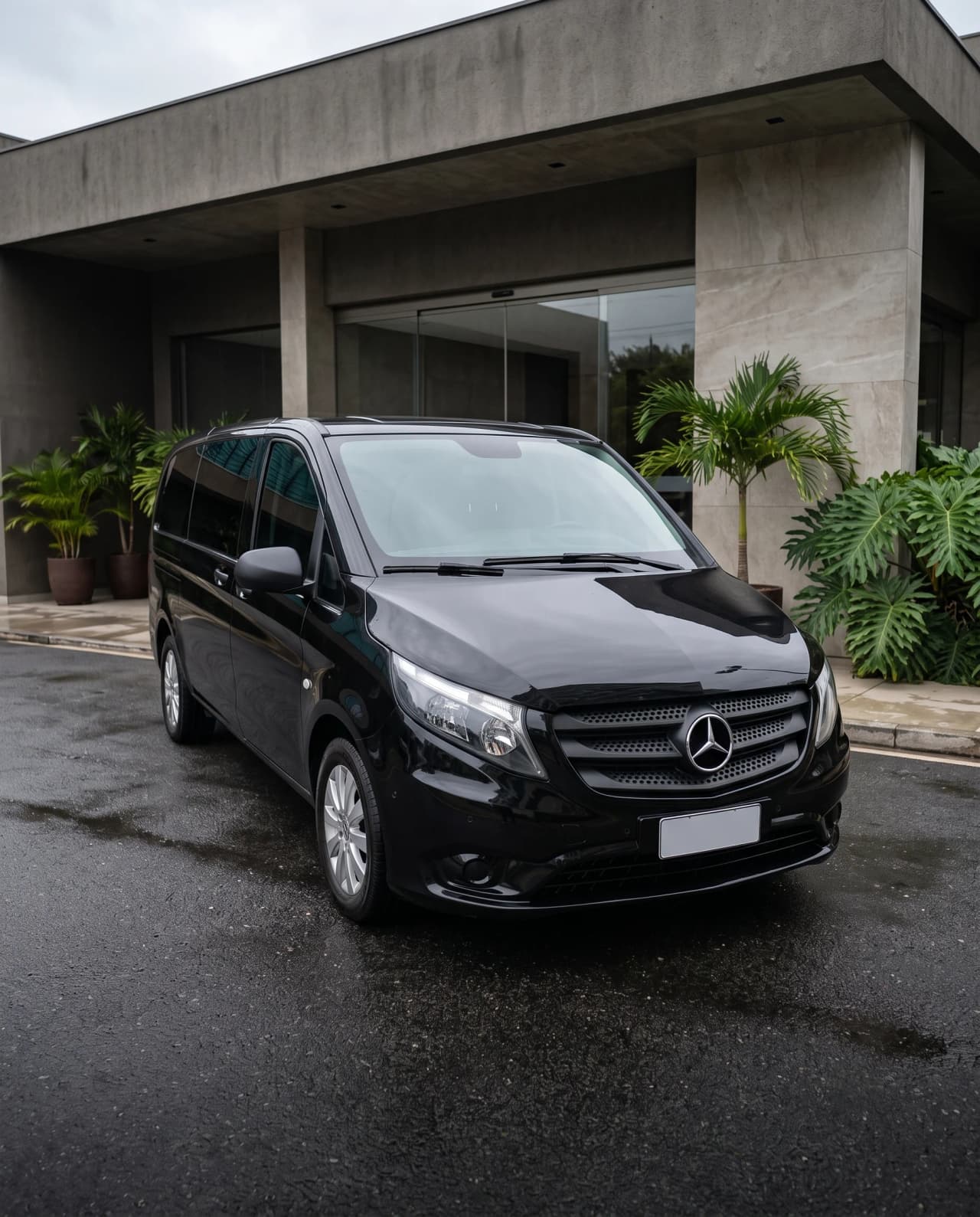 Illustrative black Mercedes-Benz executive van in a composed venue setting in Brazil